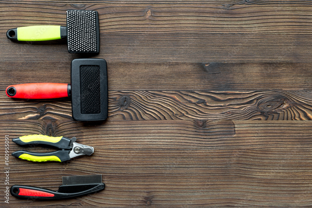 Pet care set on wooden table background top view mockup