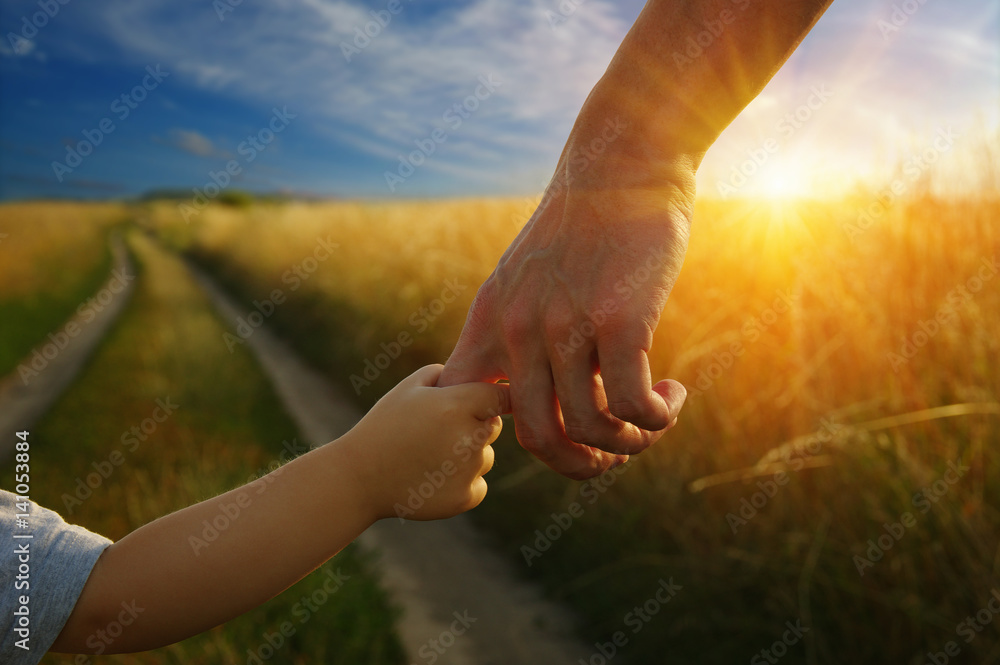 hands of the parent and litlle child