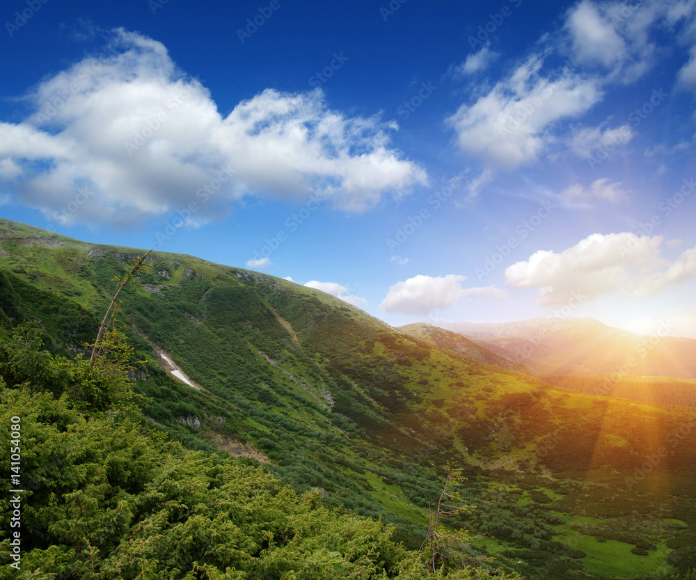 Mountain landscape on sun