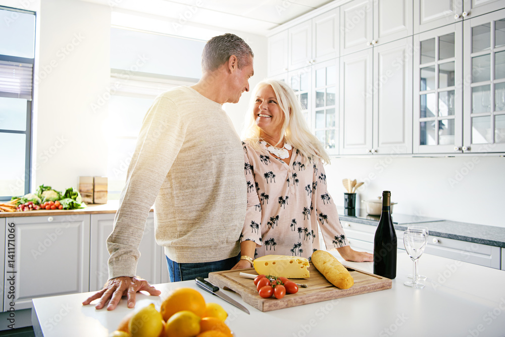 Elderly couple at their kitchen