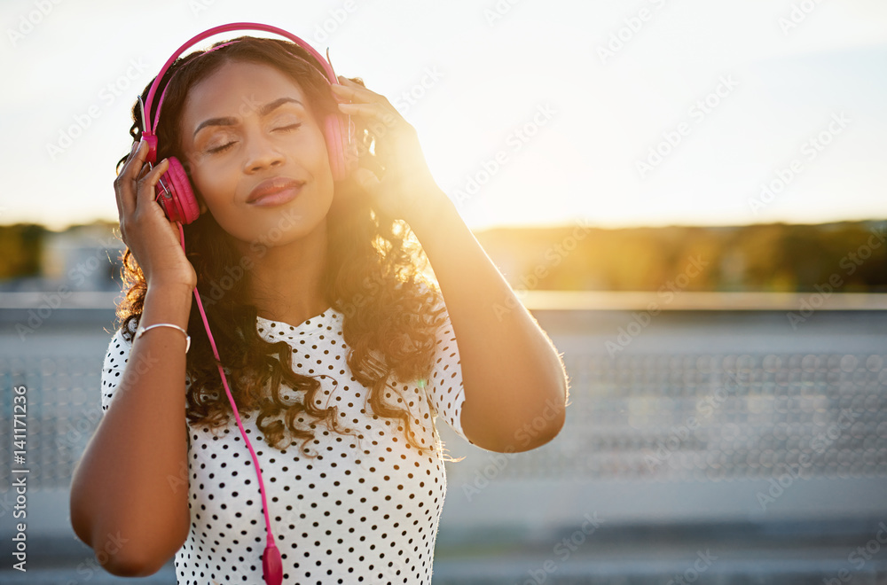 Woman enjoying the flow of music