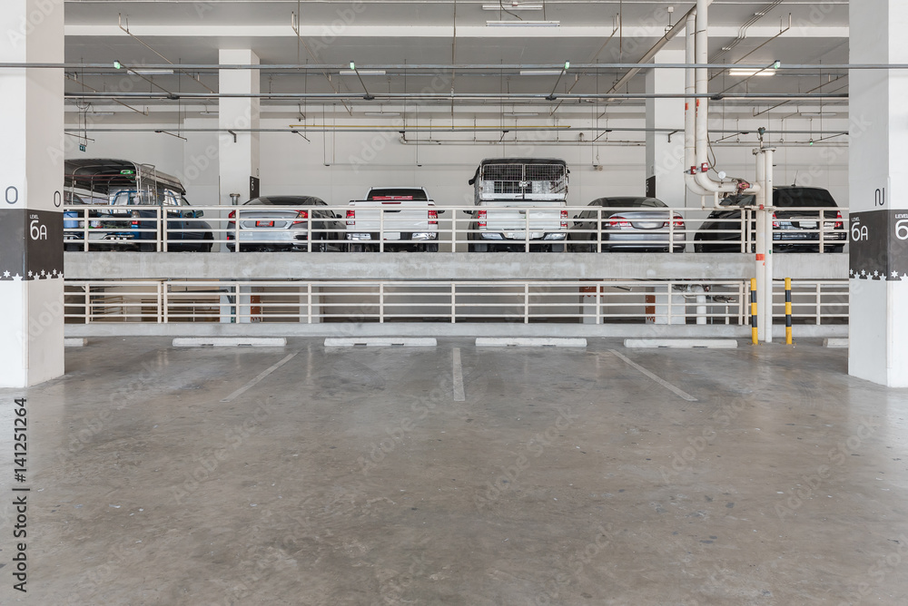 interior of parking garage with car