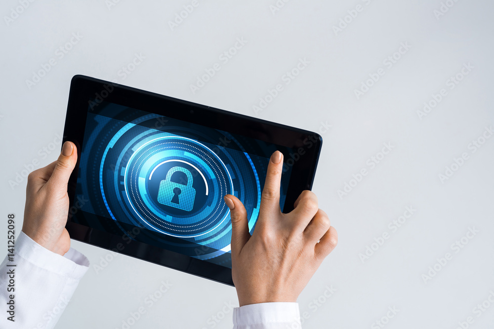 Close of female doctor hands working with tablet pc computer