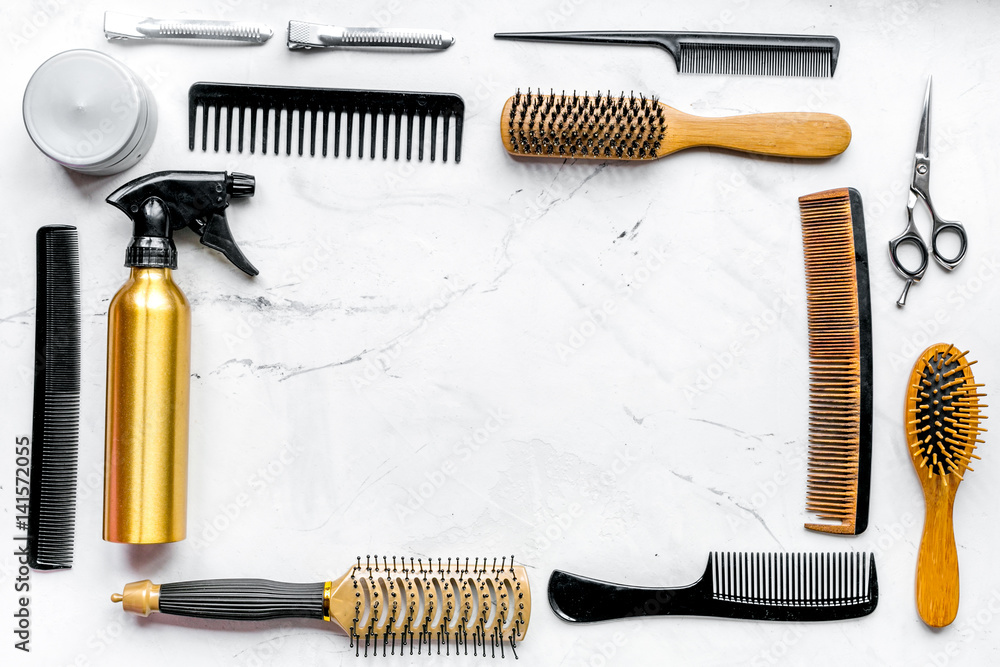 hairdressing concept with barber tools on white background top view mock up