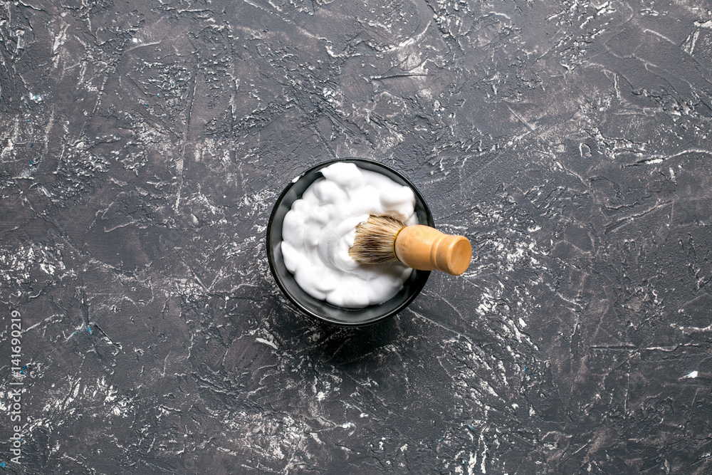 Tools for shaving in barbershop on workplace background top view mock-up