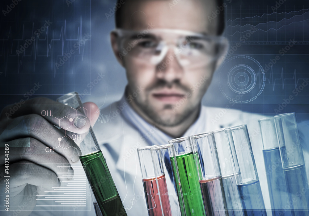 Young scientist mixing reagents in glass flask in clinical laboratory