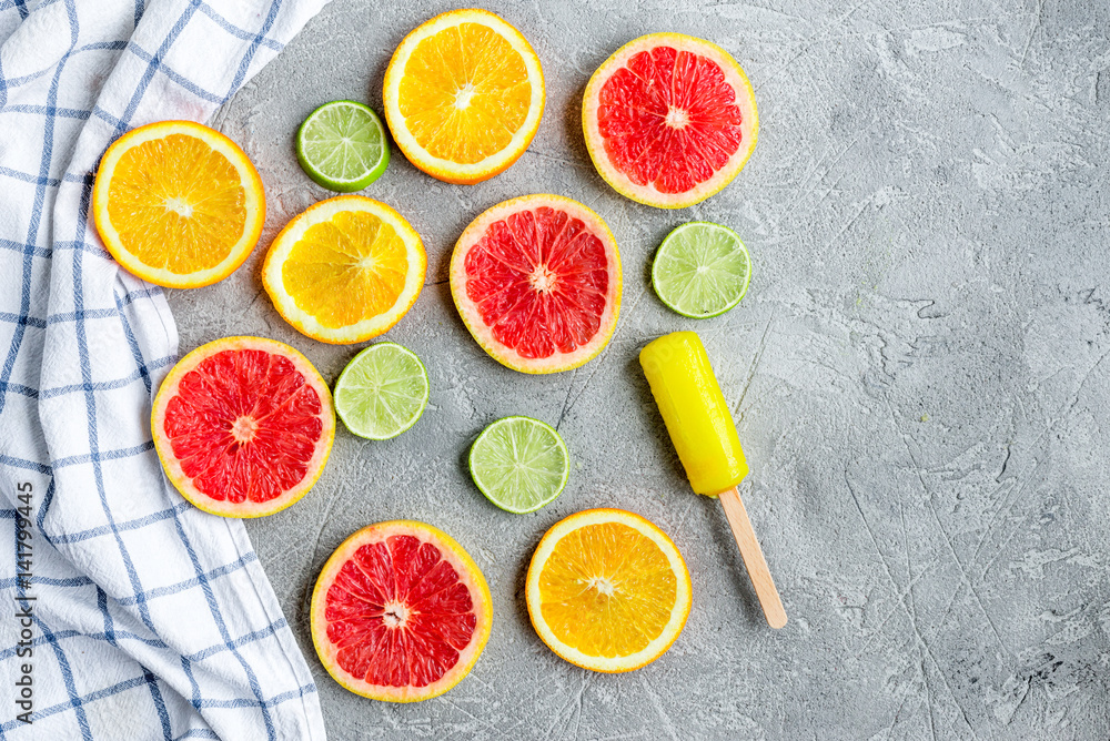 Orange icecream with fruits on table background top view mock-up