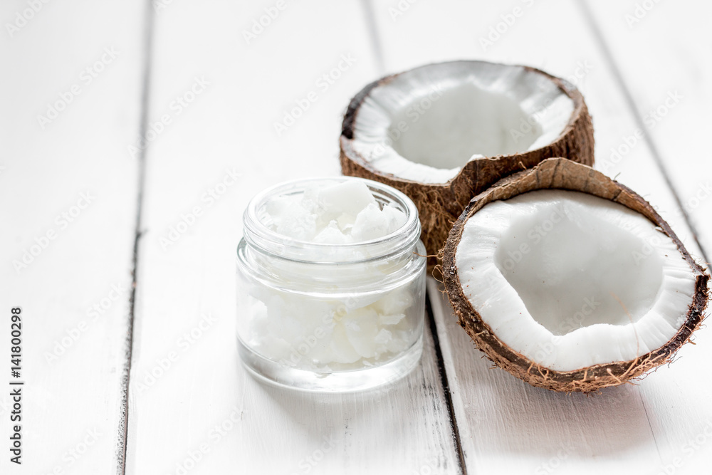 coconut oil for body care in cosmetic concept on white desk mock up