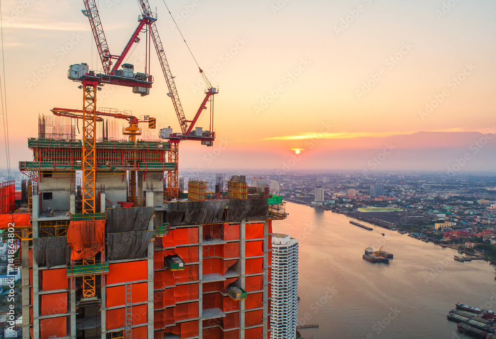 Construction site with cranes. Construction workers are building.Aerial view.Top view.