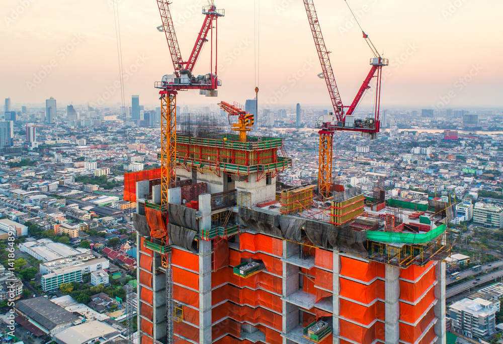 Construction site with cranes. Construction workers are building.Aerial view.Top view.