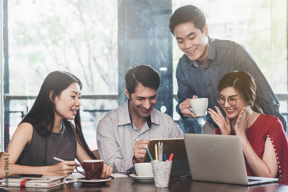 4 people meeting in coffee shop, business casual conceptual