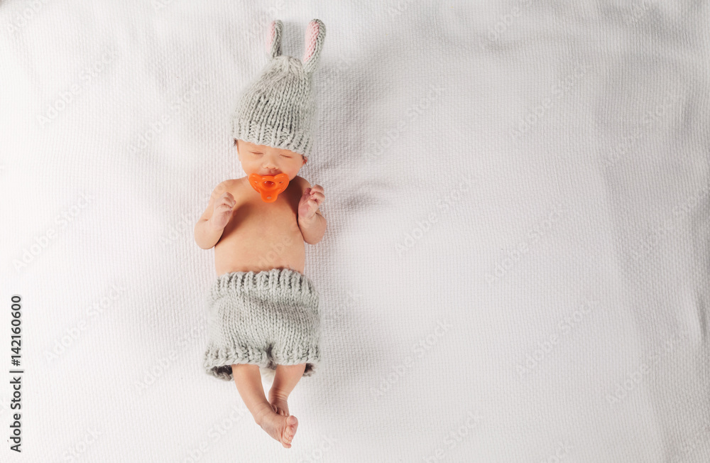 Newborn infant baby boy on a blanket