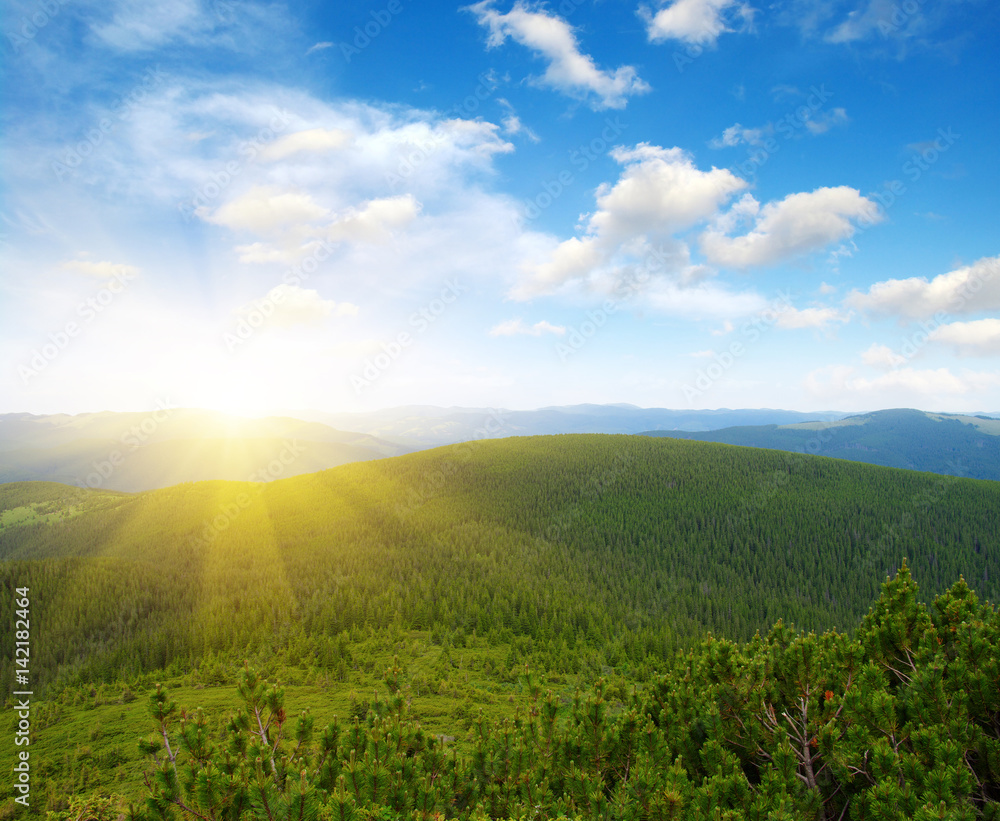 Mountain landscape on sun