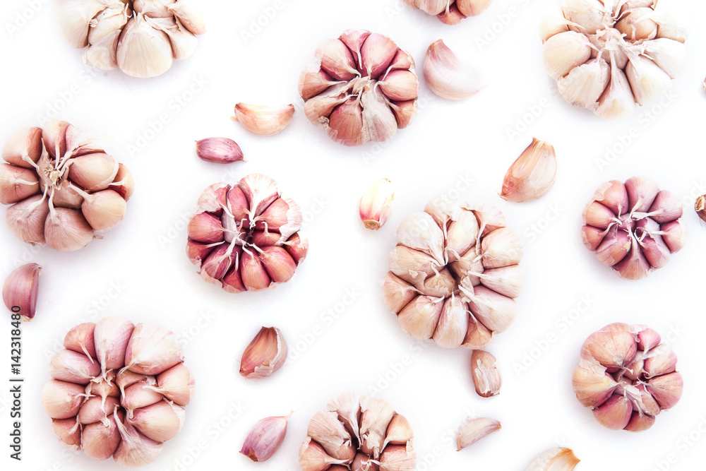 Top view of garlic bulb as pattern background on white