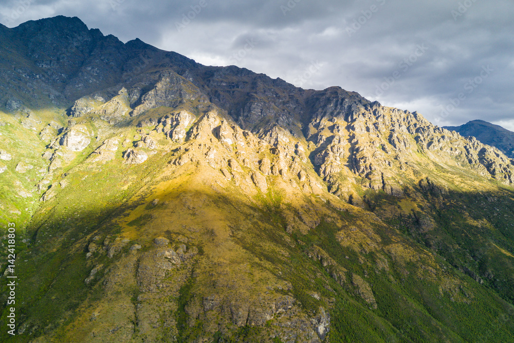 Aerial view of mountains at sunset, Queenstown, New Zealand.