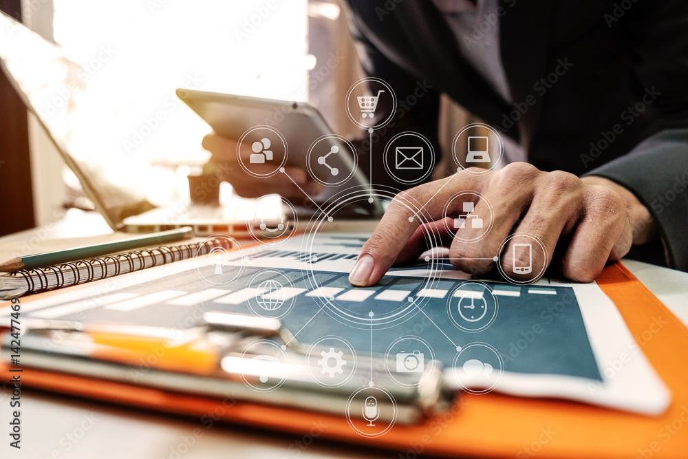 businessman working with digital tablet computer and smart phone with financial business strategy la