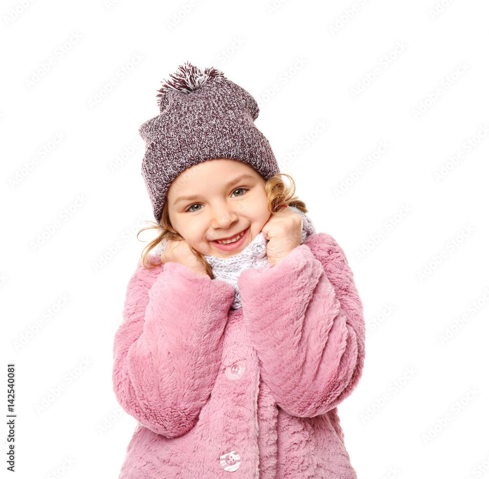 Cute little girl in warm clothes on white background