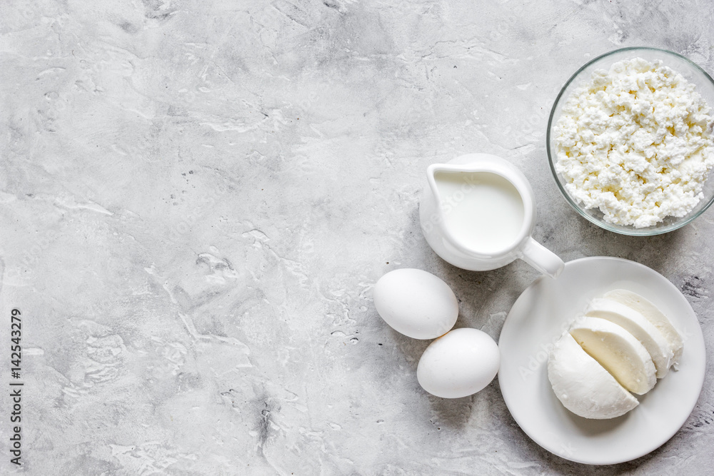 Healthy food concept with milk and eggs on table top view mockup