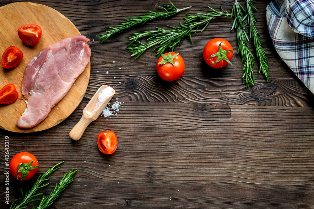 meat for steak with rosemary and tomato on table top view mockup