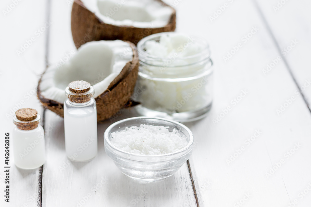 cosmetic concept with fresh coconuts on white table background mockup