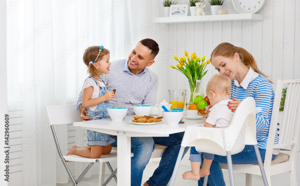 Happy family  at breakfast