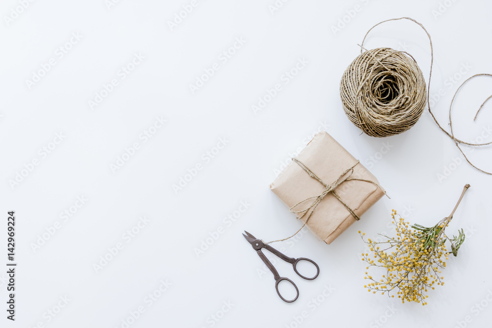 wrapping gifts concept for holiday on white background top view mock up