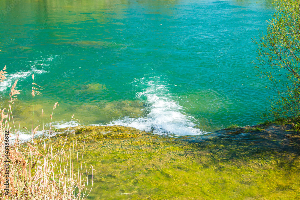 Beautiful clear green water and on Mreznica river in Croatia, panoramic view. 