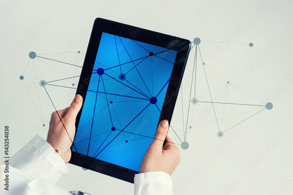 Close of female doctor hands working with tablet pc computer