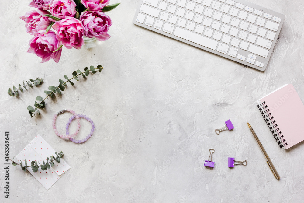 Woman office desk with flowers on white background top view mockup