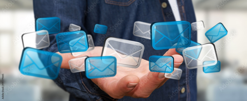 Businessman holding digital email icons ‘3D rendering’