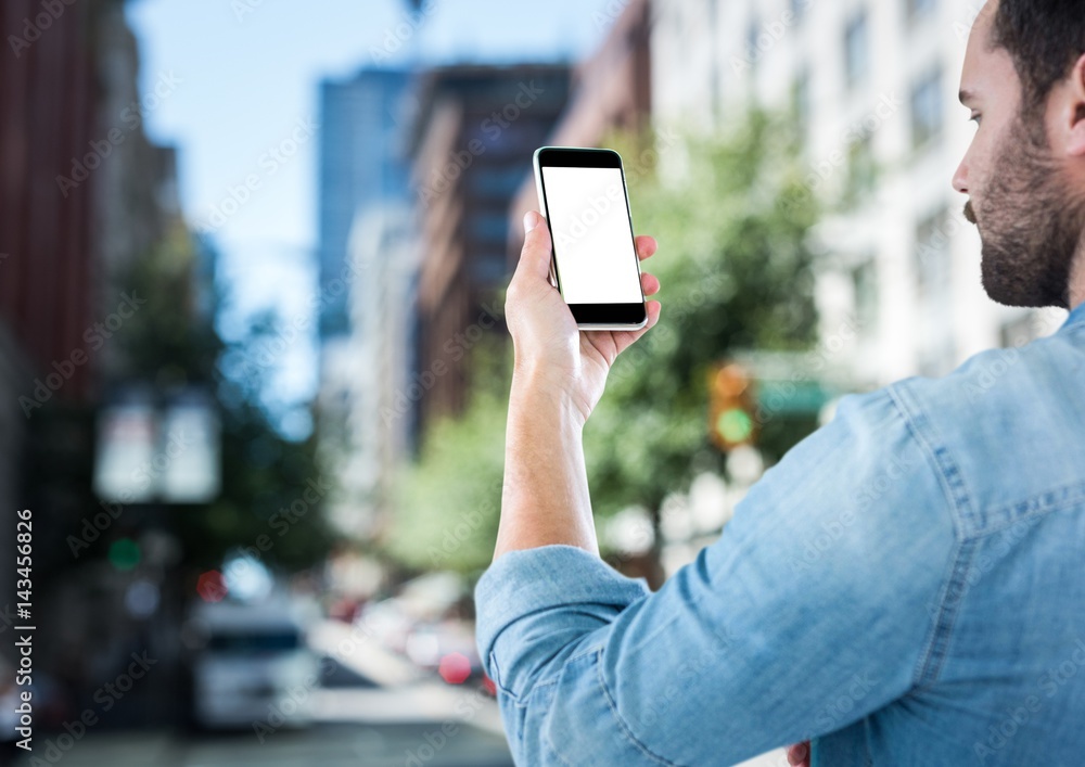 men with phone in the city