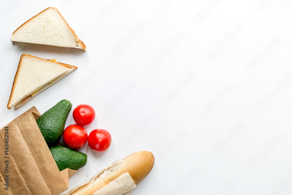 Healthy food in package on white table background top view mock up