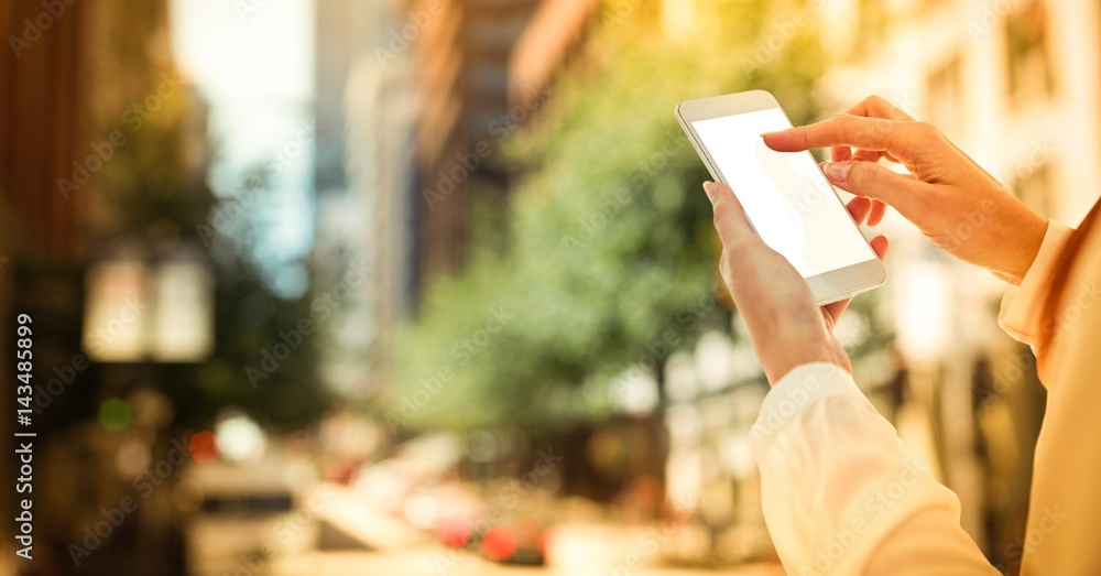 women hands with mobile in the city