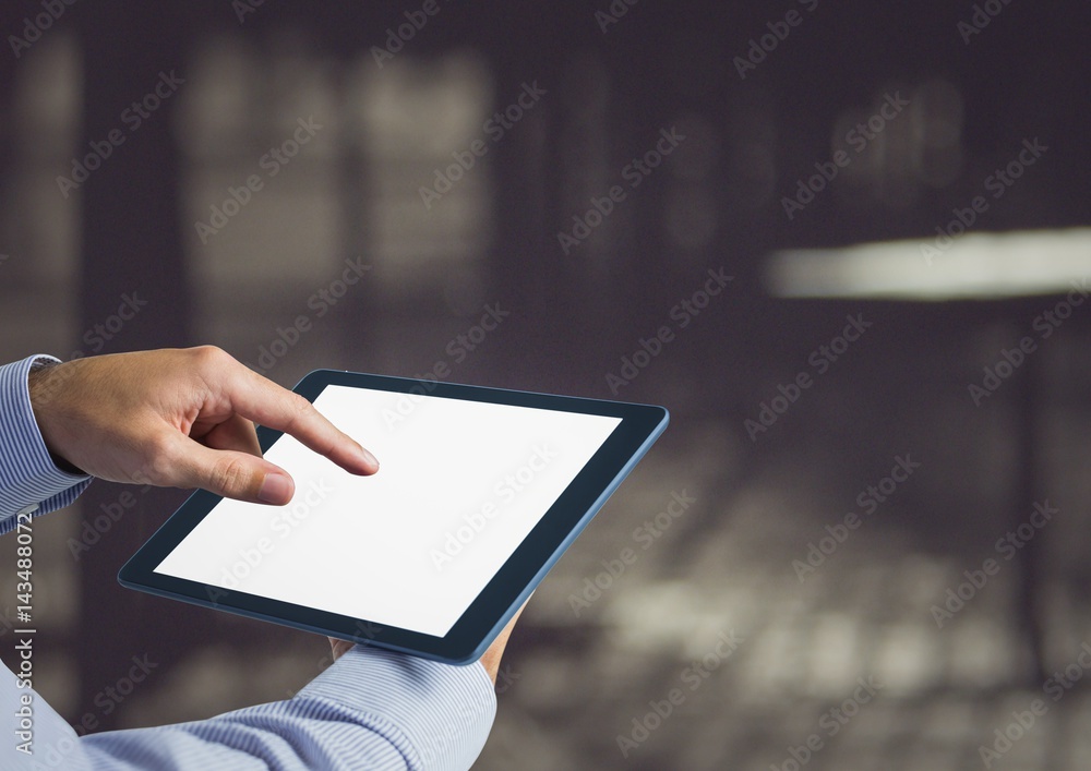 hands with tablet in a terrace