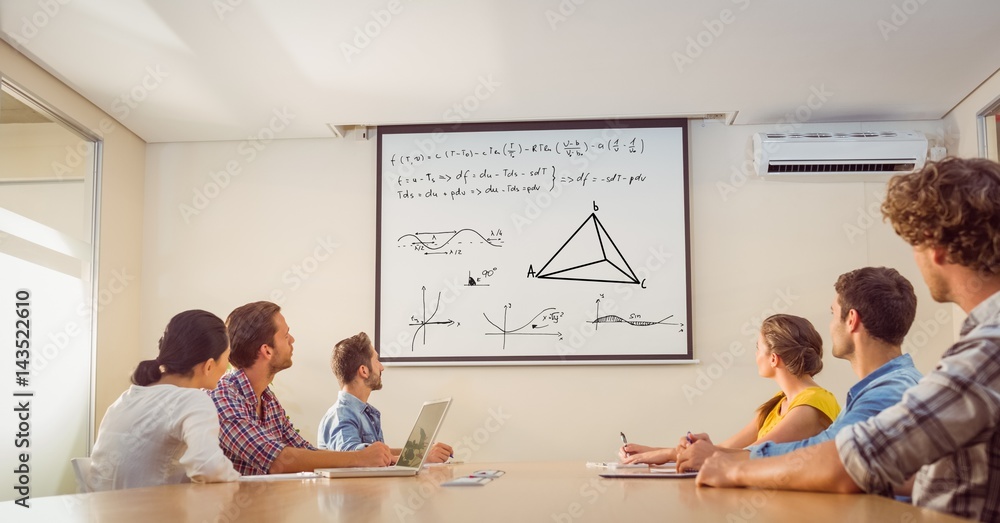 Business people looking at match equation on screen