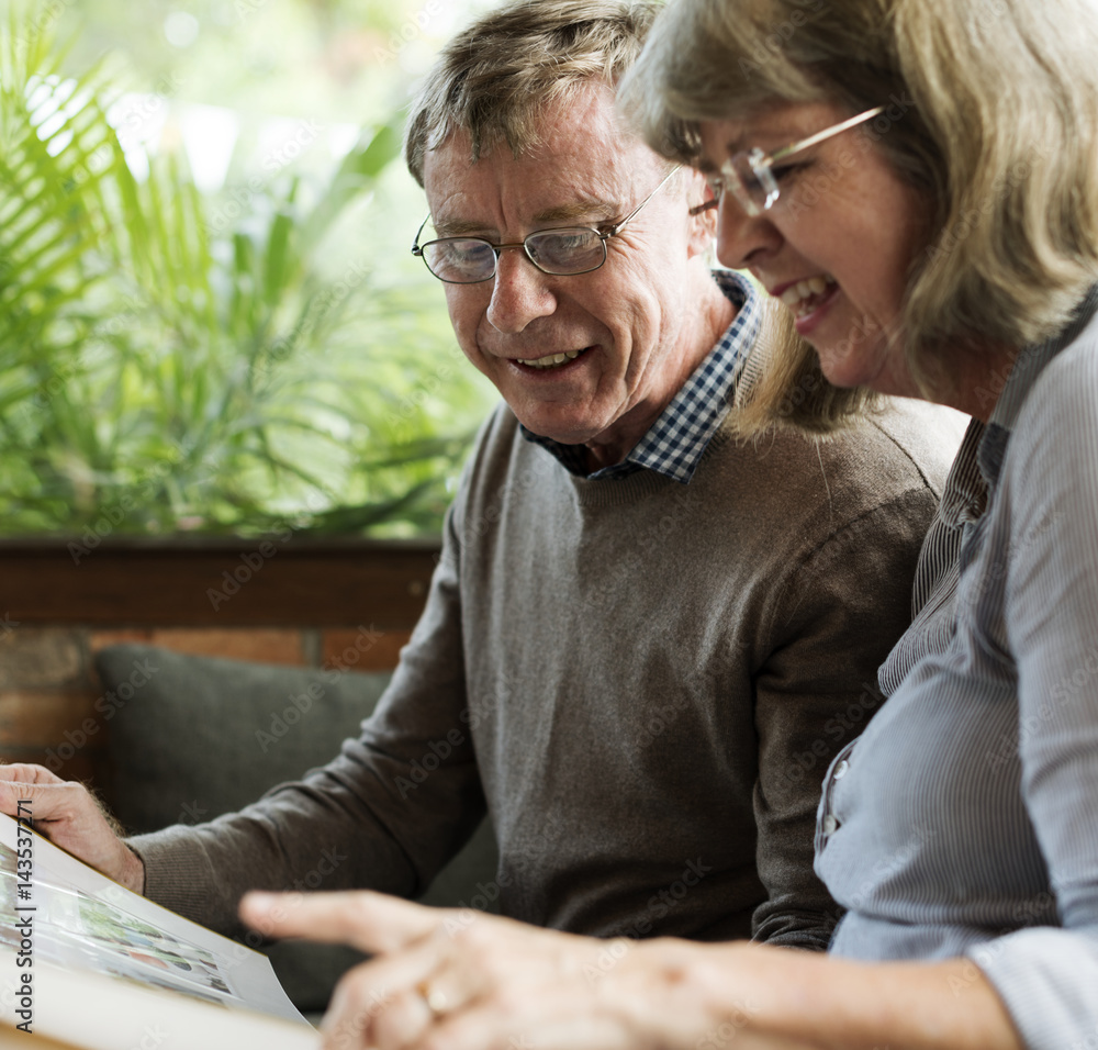 Mature Couple Reading Books Together