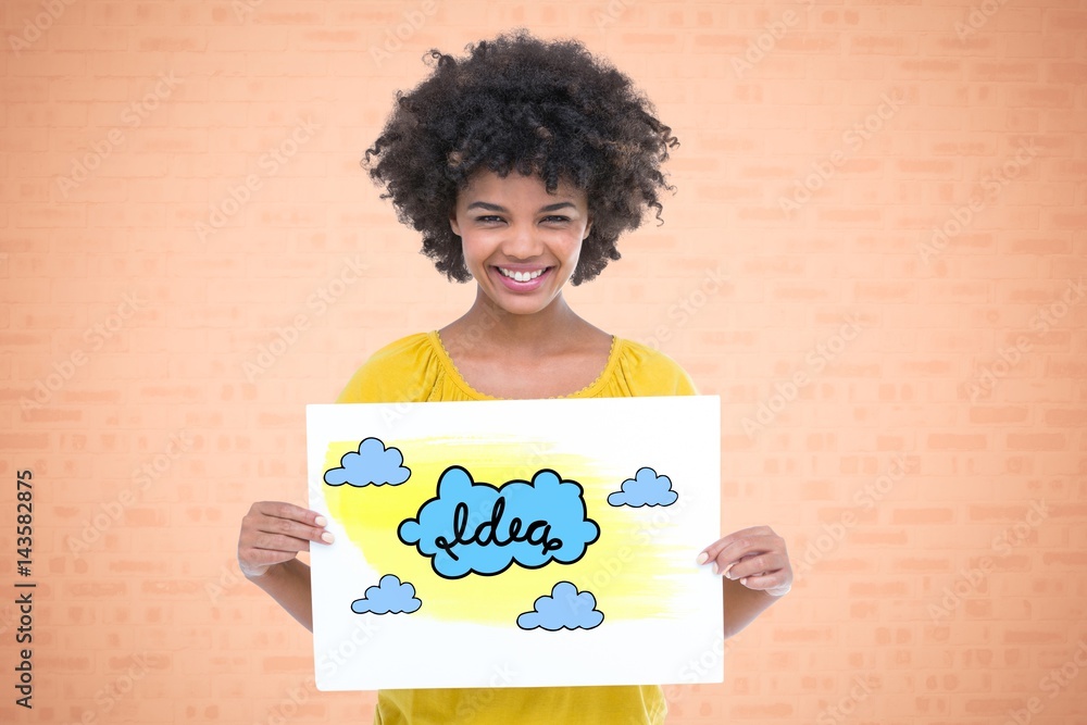 Woman holding drawing of clouds representing