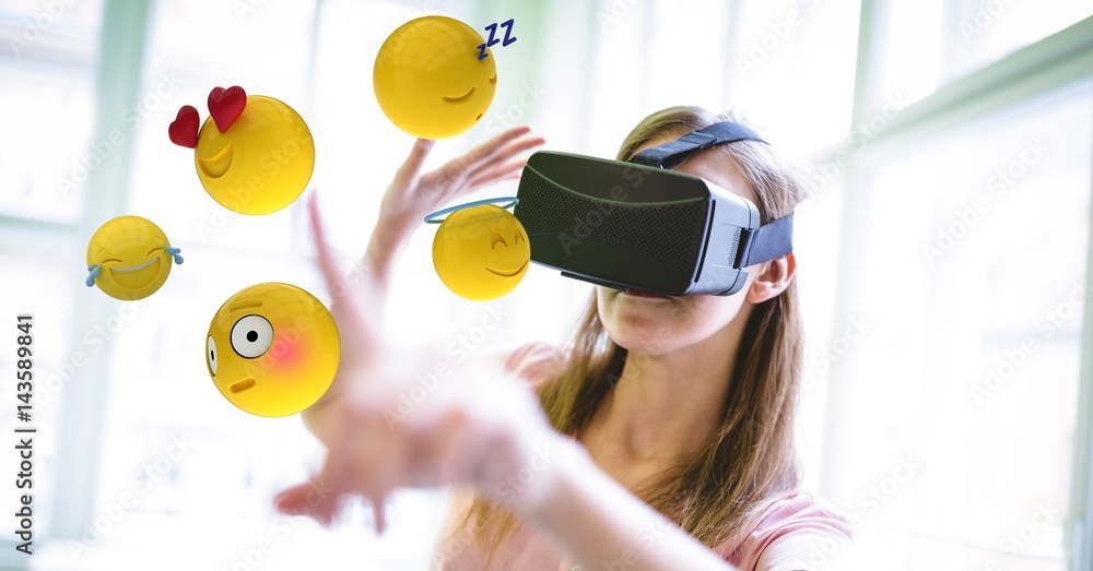 Woman in  VR glasses touching various emojis