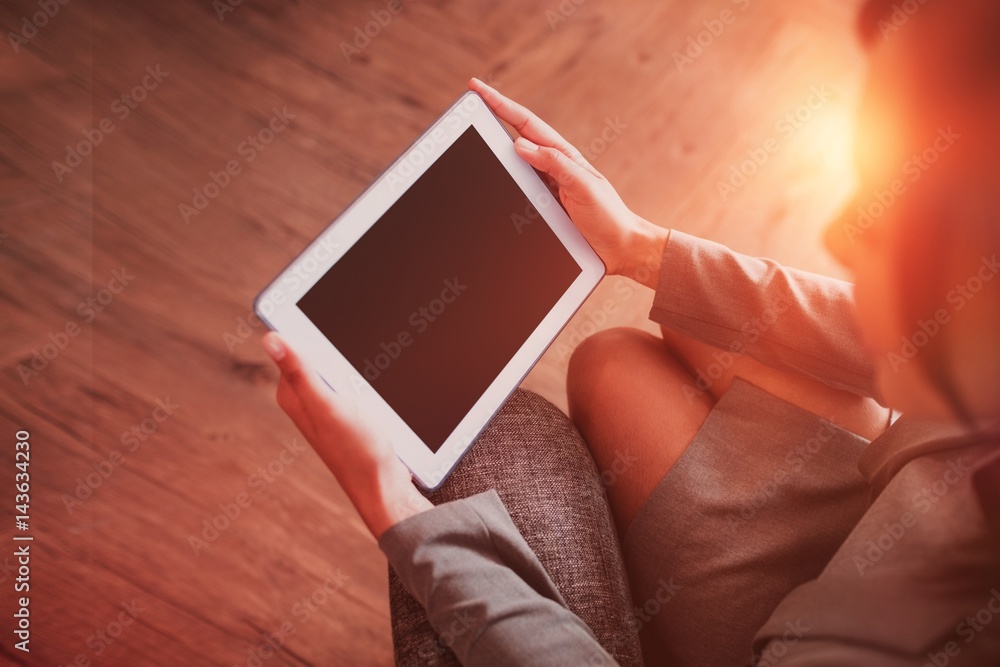 Businesswoman using tablet