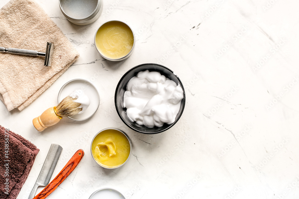 Tools for shaving in barbershop on workplace background top view mockup