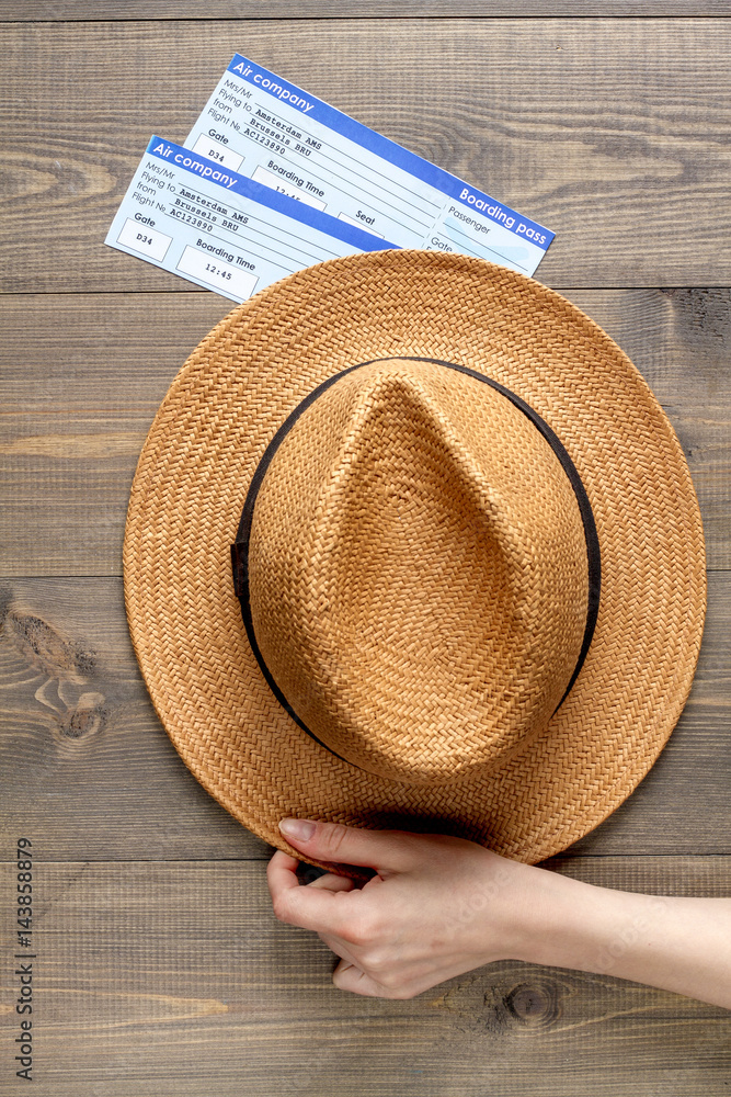 journey planning with tourist outfit on wooden table background top view