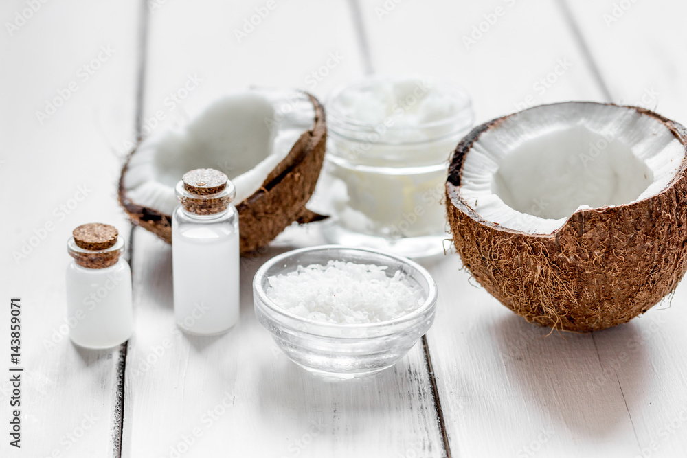 organic cosmetics concept with coconut on table background