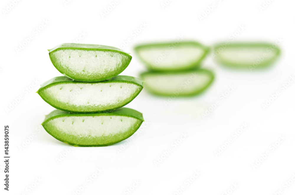   Aloe Vera Gel and Cut Aloe Vera Leaves on White Background