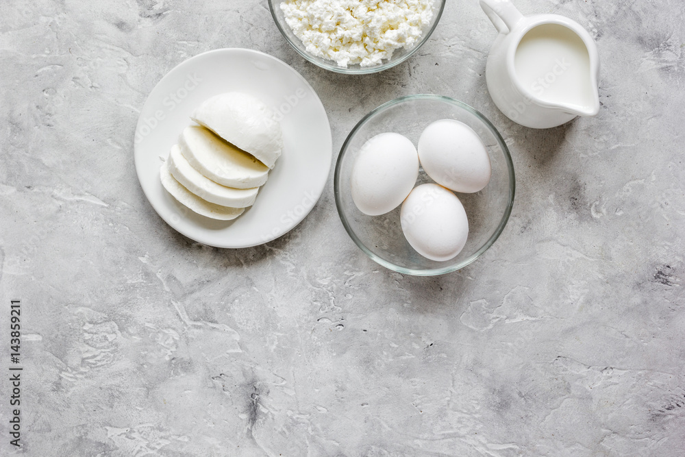 Healthy food concept with milk and eggs on table top view mockup