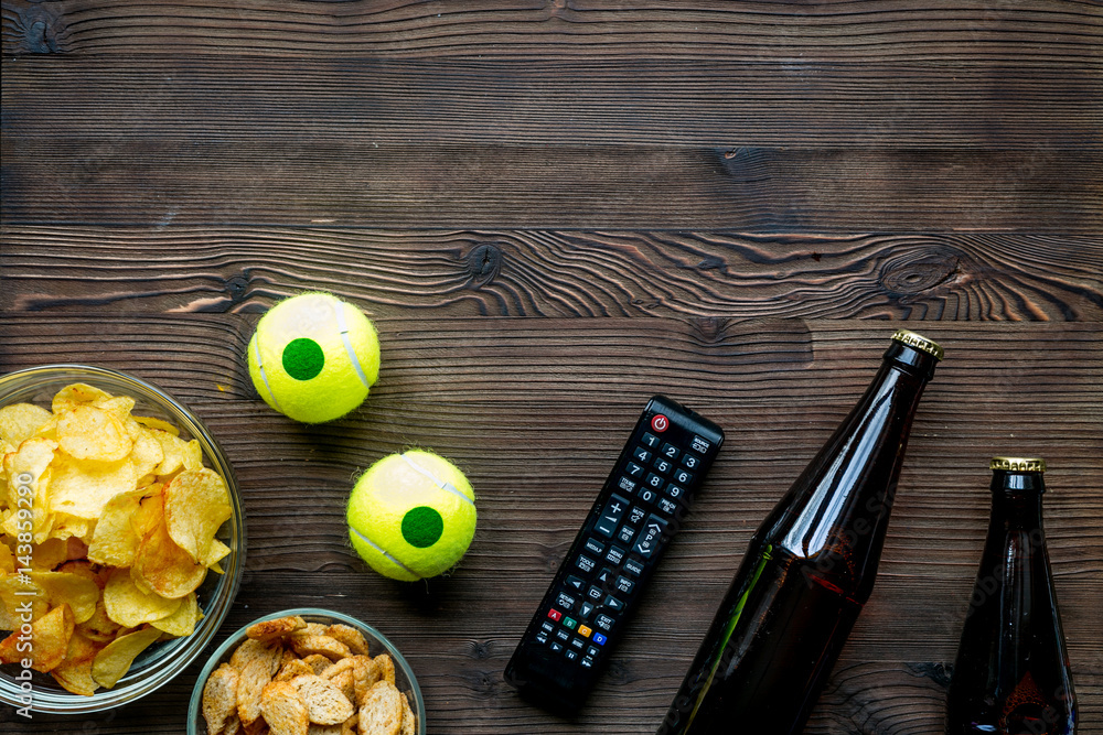 snacks for watching sport match on wooden background top view mock-up