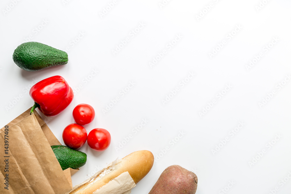 food set with vegetables and baguette on table background top view mock-up