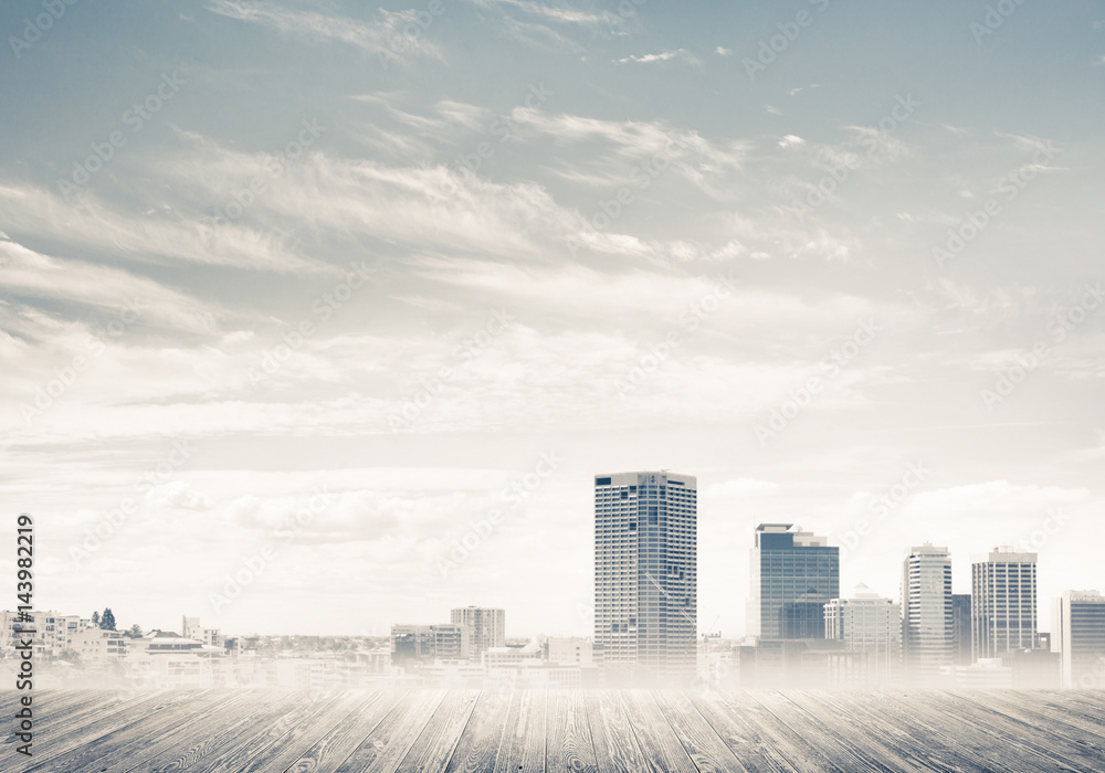 Modern urban buildings skyscrapers blue cloudy sky background an