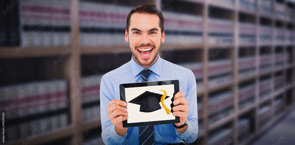 Composite image of happy businessman showing his tablet pc 