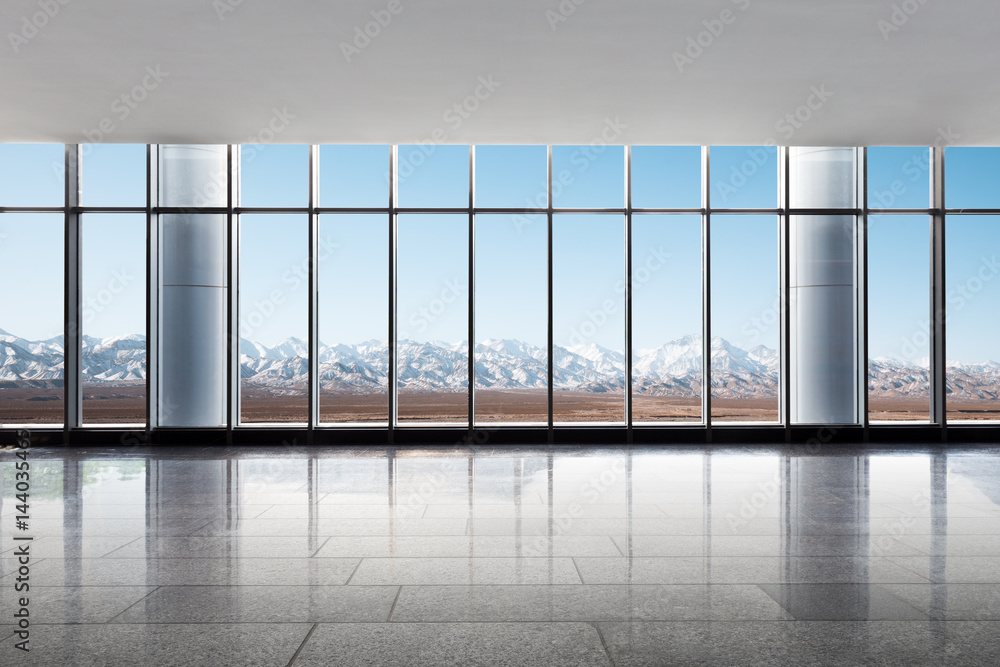 empty office with white snow mountains