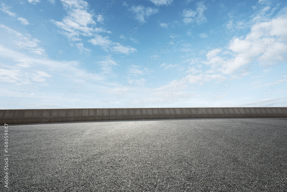 empty road with blue sunny sky